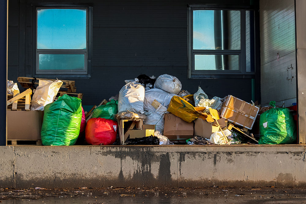 Household furniture and clutter on a porch, from the JMK photo library